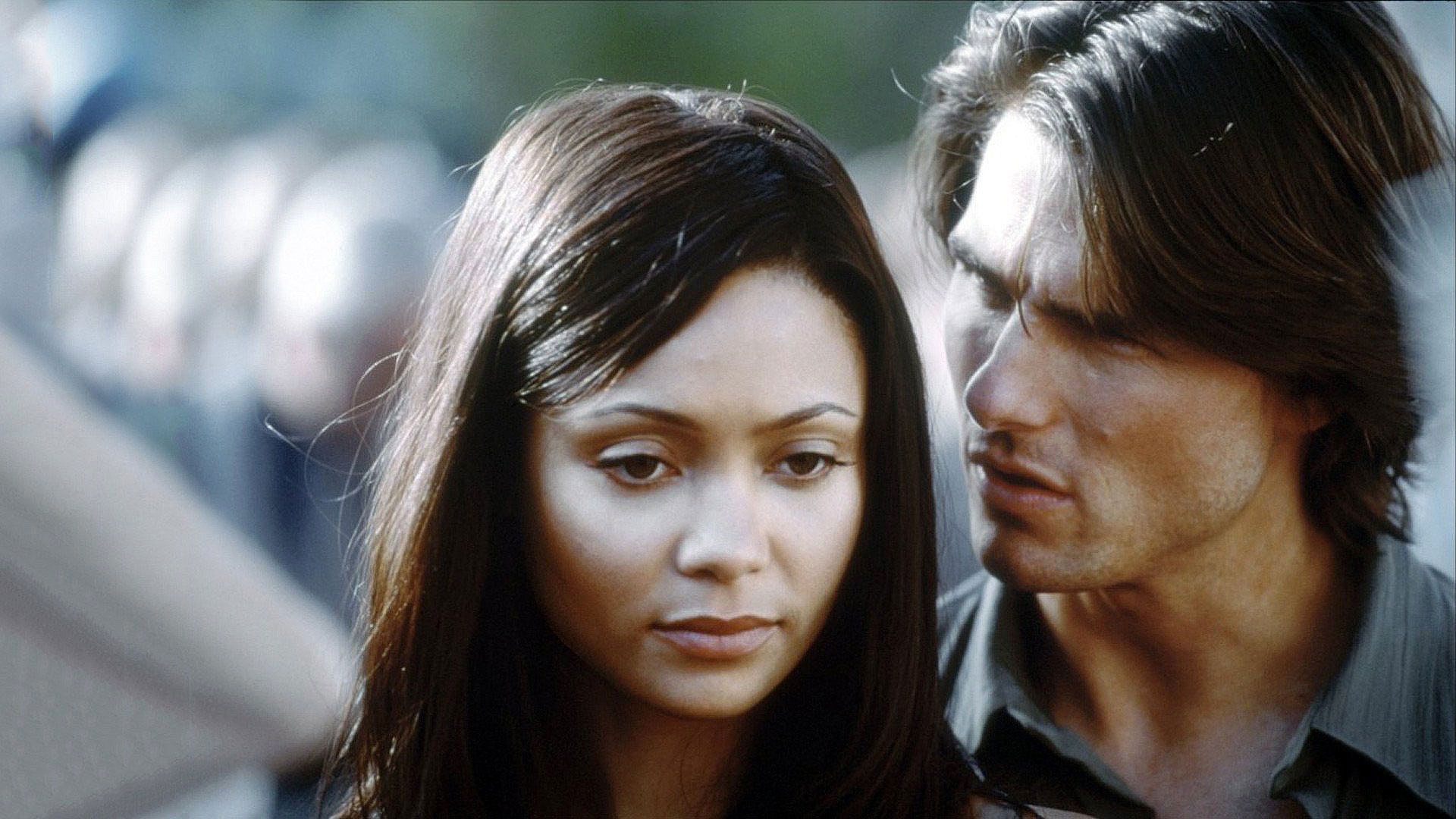 Thandie Newton y Tom Cruise