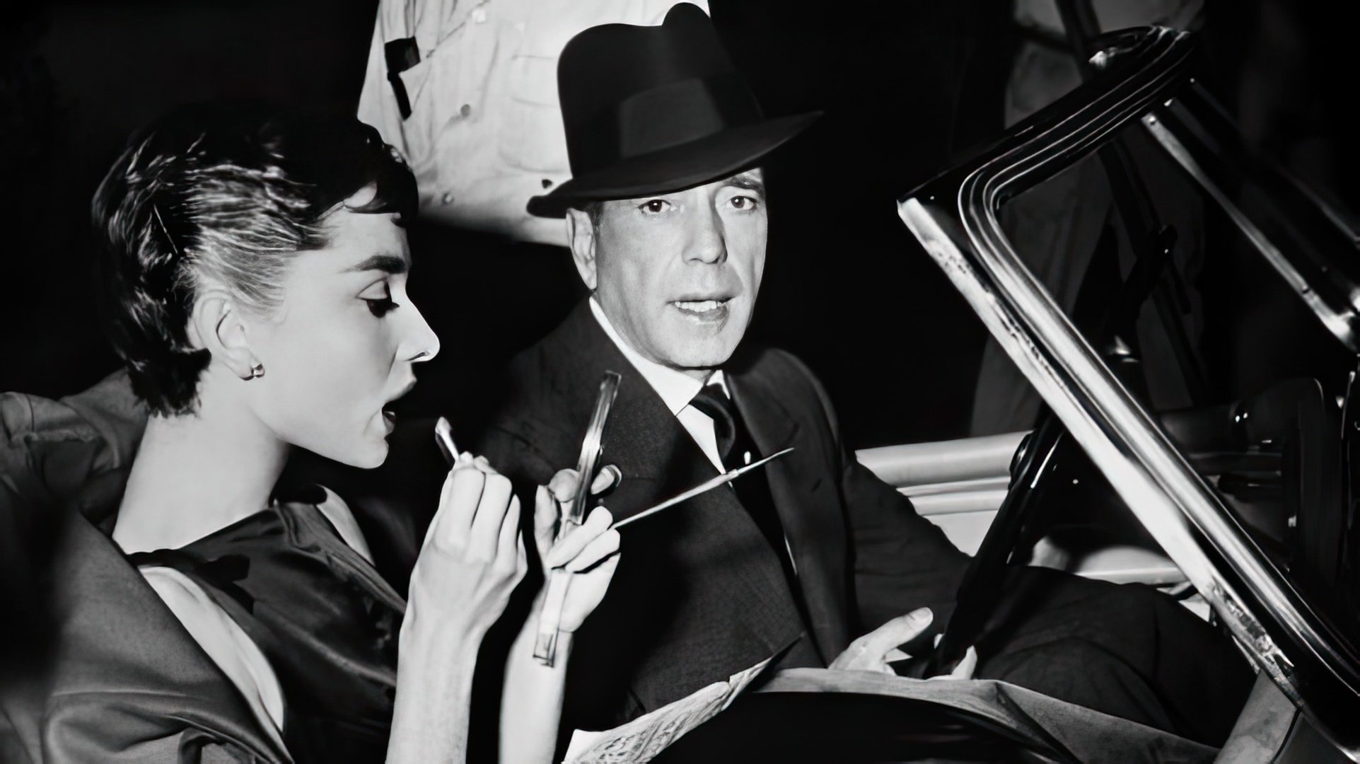 Audrey Hepburn y Humphrey Bogart en el set de 'Sabrina'