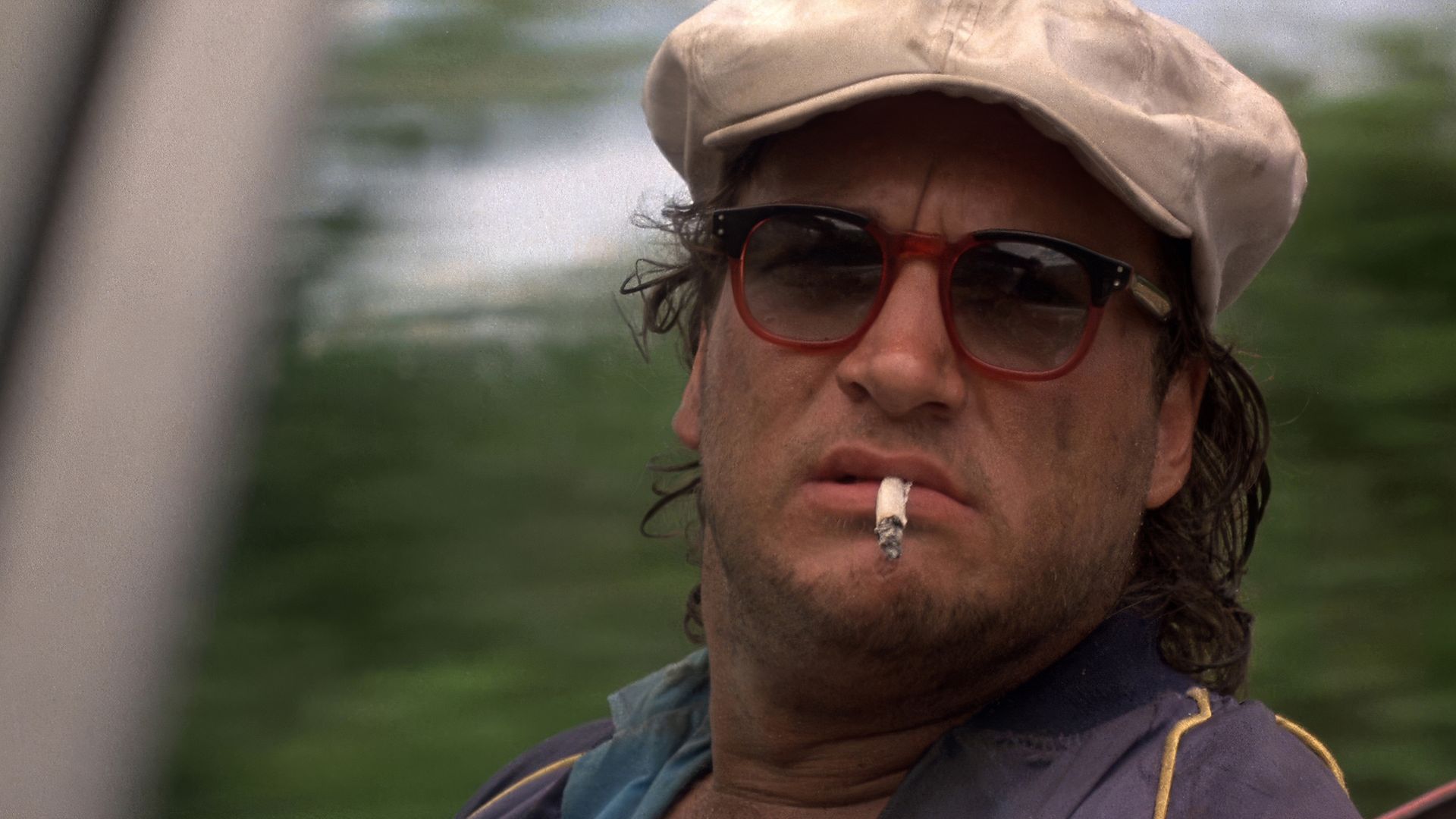 Jim Belushi en la película Salvador