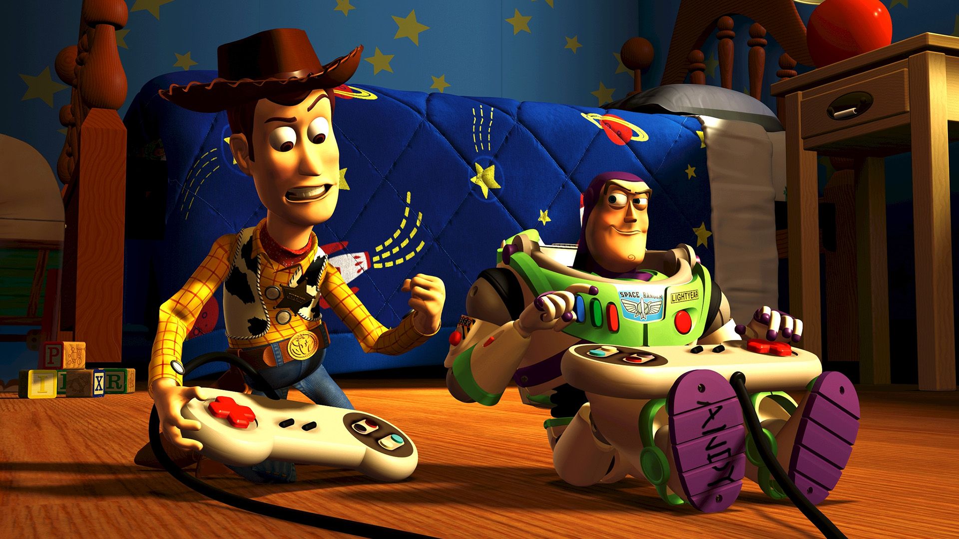 Una escena del dibujo animado: un vaquero de juguete y un astronauta jugando videojuegos en el suelo de una habitación infantil