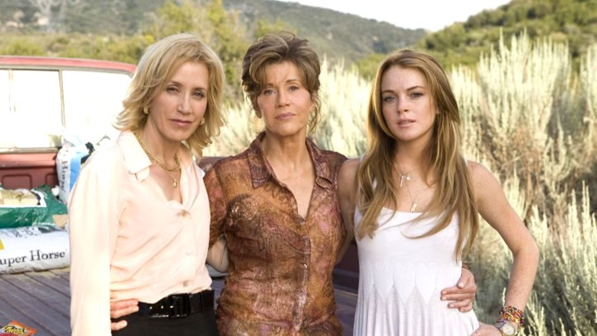 Felicity Huffman, Jane Fonda y Lindsay Lohan posan para la cámara en la calle
