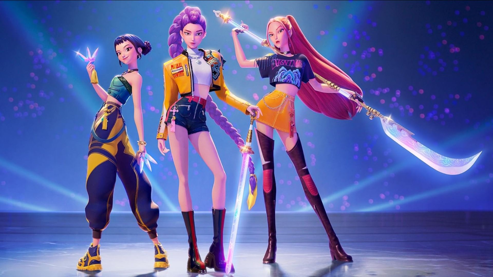 Tres chicas de dibujos animados con ropa azul y amarilla paradas en el escenario